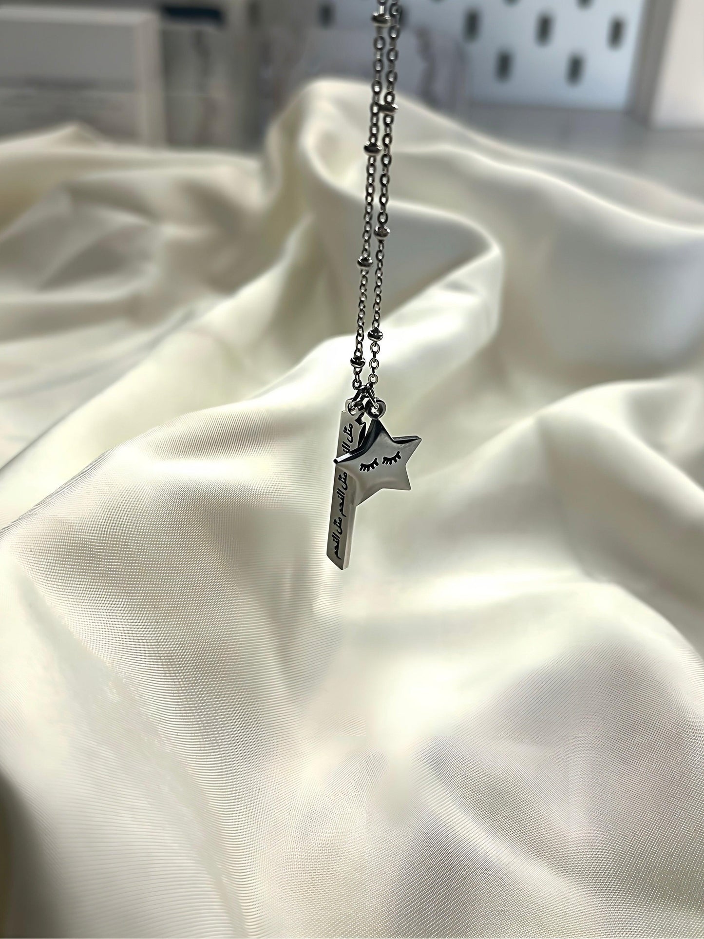 Arabic necklace, carved with Arabic writing meaning like a star