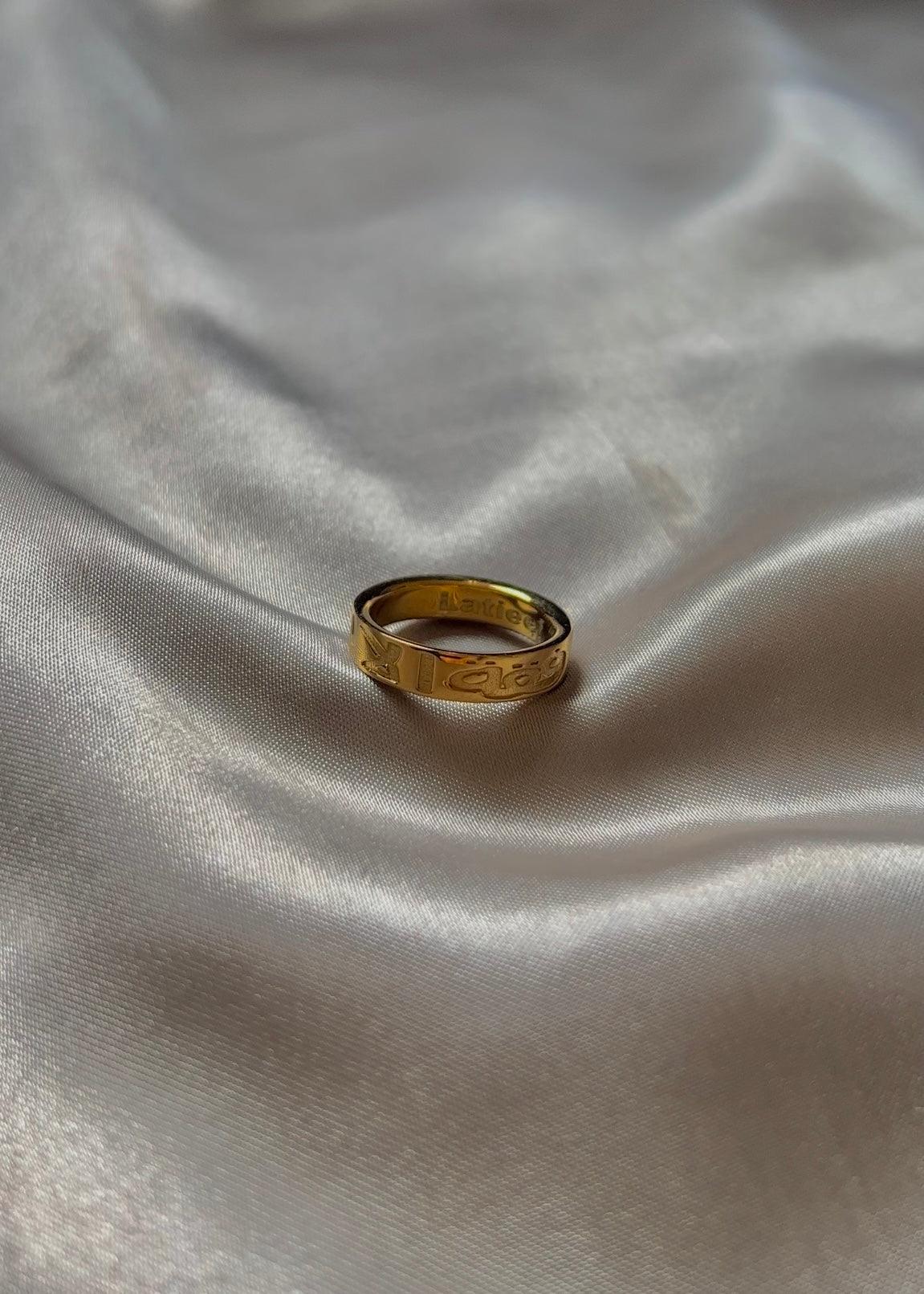 Arabic ring in gold, carved with the words in Arabic ‘commitment & companion’ the perfect ring for a forever love story